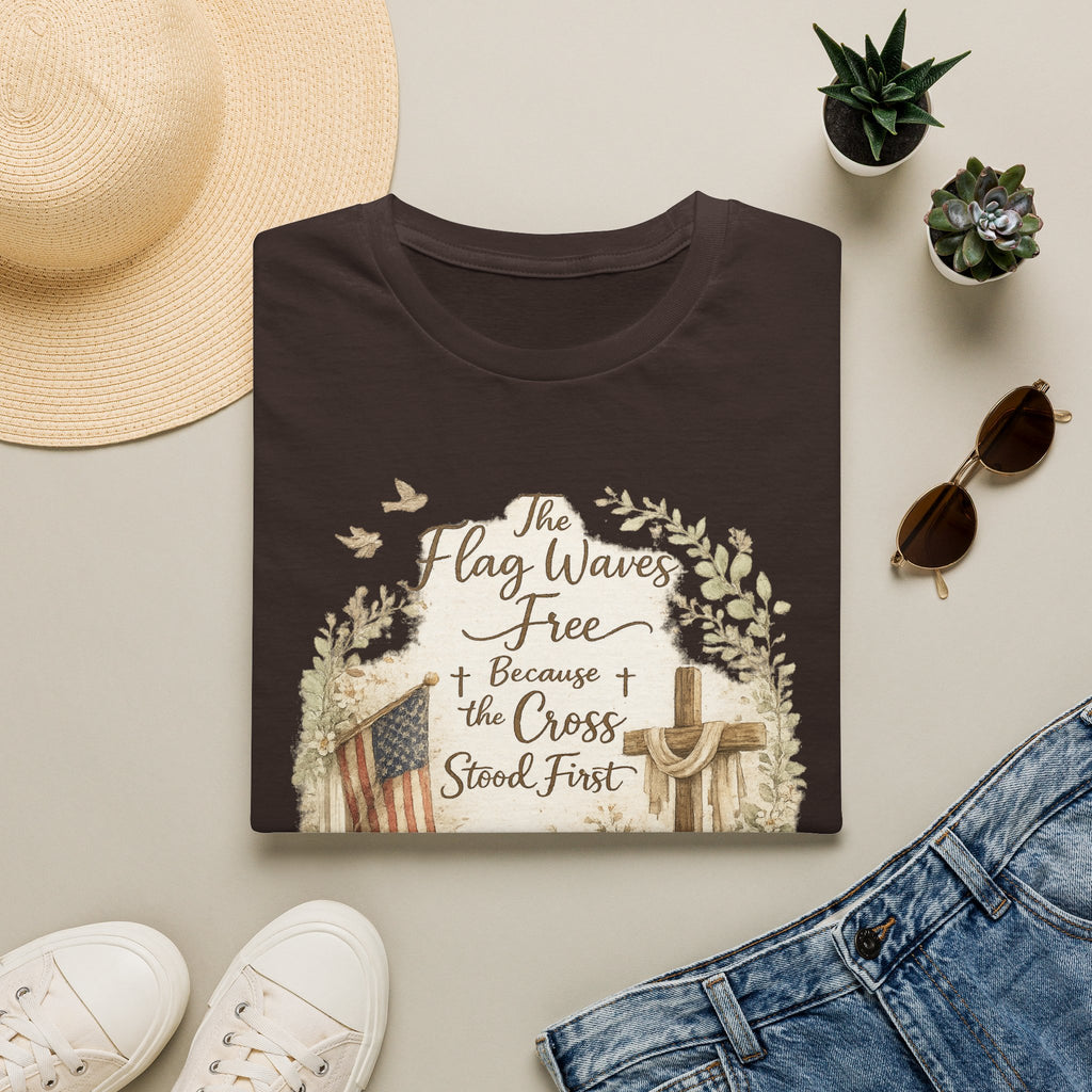 Christian Patriotic T-Shirt — “The Flag Waves Free Because the Cross Stood First”